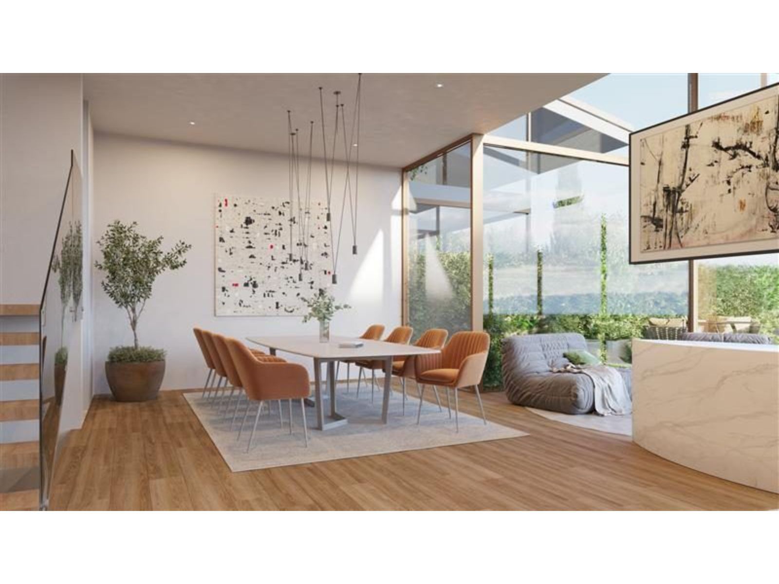 Moderne eethoek in Higueron North Residences villa's, met uitzicht op de tuin.